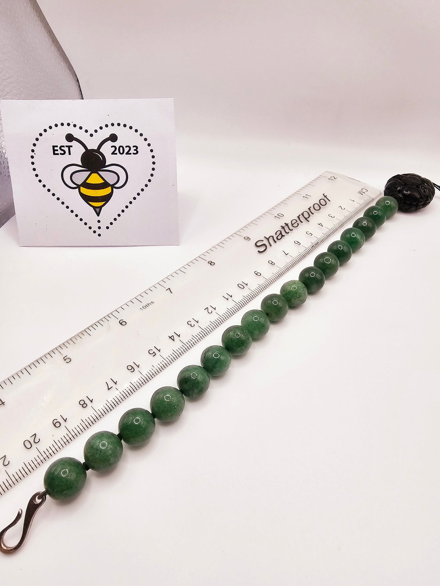 Green stone bracelet adjustable, possibly jade or aventurine...