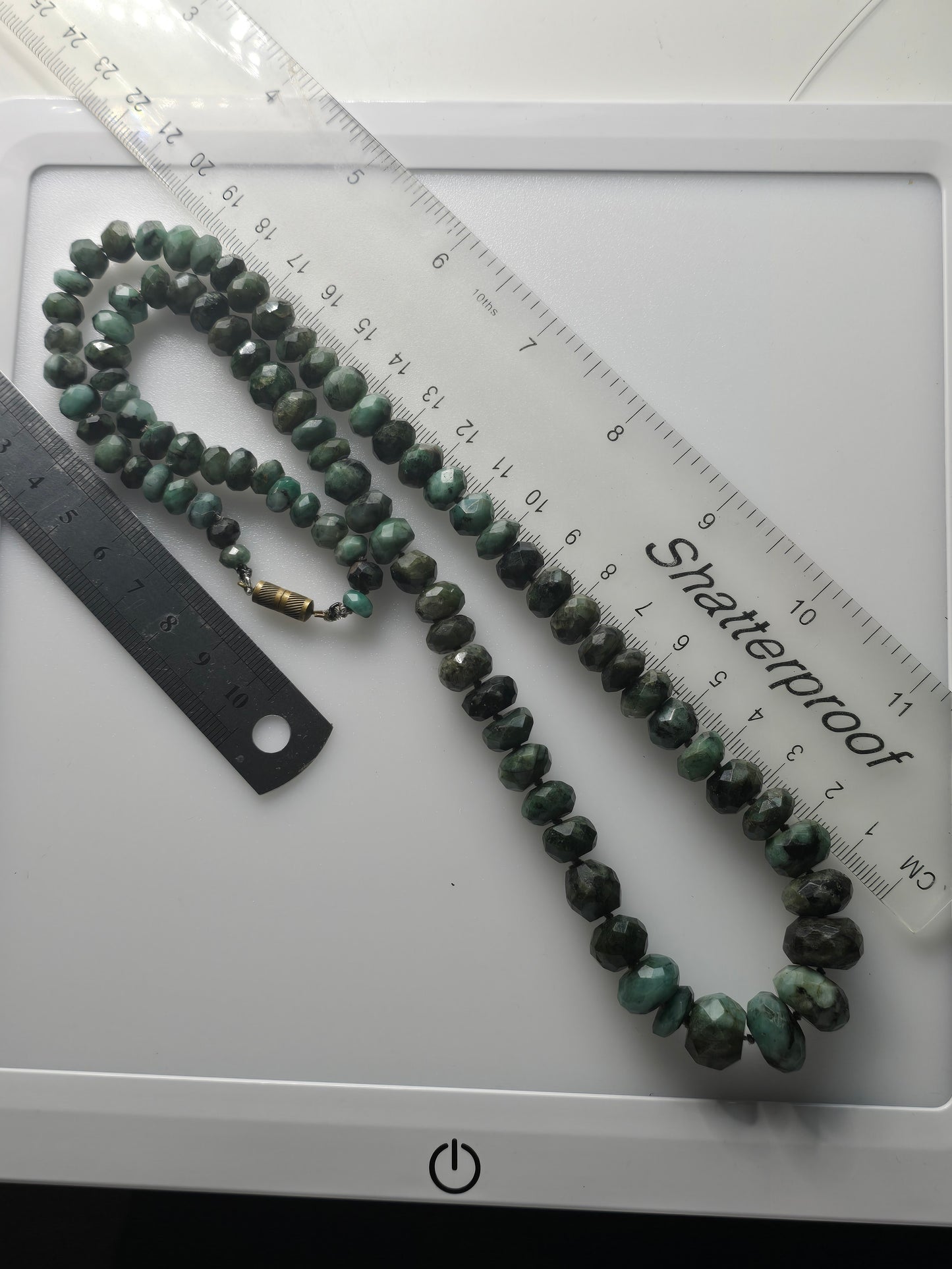 Raw emerald faceted and graduated bead necklace