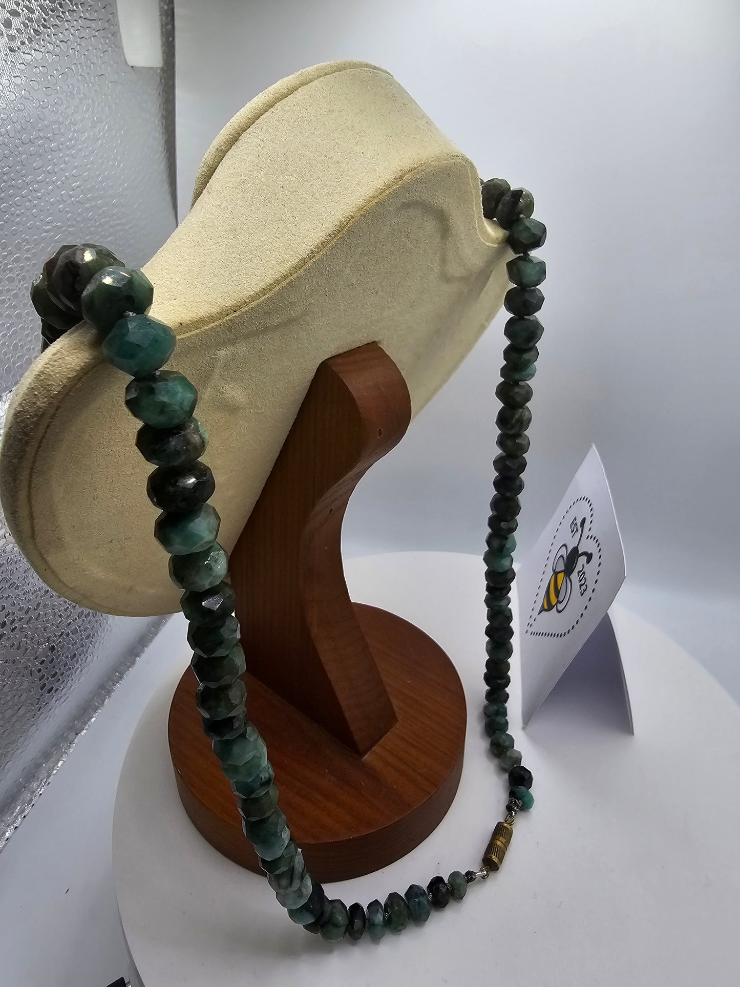 Raw emerald faceted and graduated bead necklace