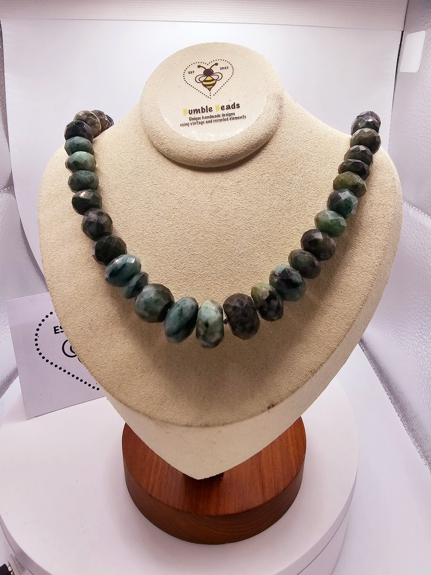 Raw emerald faceted and graduated bead necklace